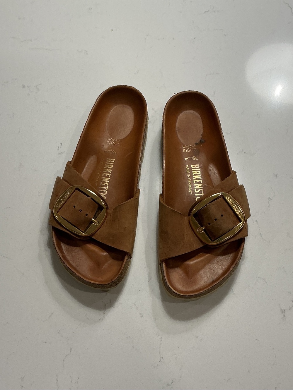 Birkenstock Brown Suede Slide Sandals with Gold Buckles